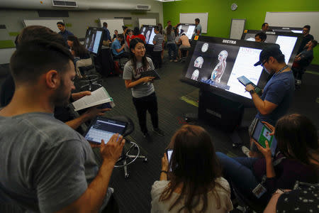 First-year medical student Jenny Hong participates with classmates, in their virtual anatomy class at the UNLV School of Medicine in Las Vegas, Nevada, U.S., August 27, 2018. Picture taken August 27, 2018. REUTERS/Mike Blake