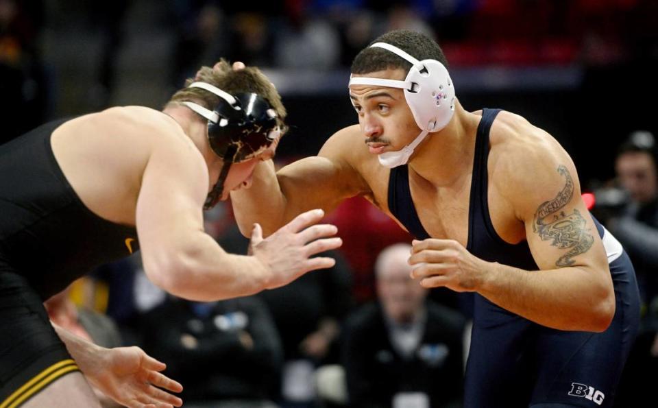 Penn State’s Aaron Brooks wrestles Iowa’s Zach Glazier in the 197 lb championship bout of the Big Ten Wrestling tournament at the Xfinity Center at the University of Maryland on Sunday, March 10, 2024.