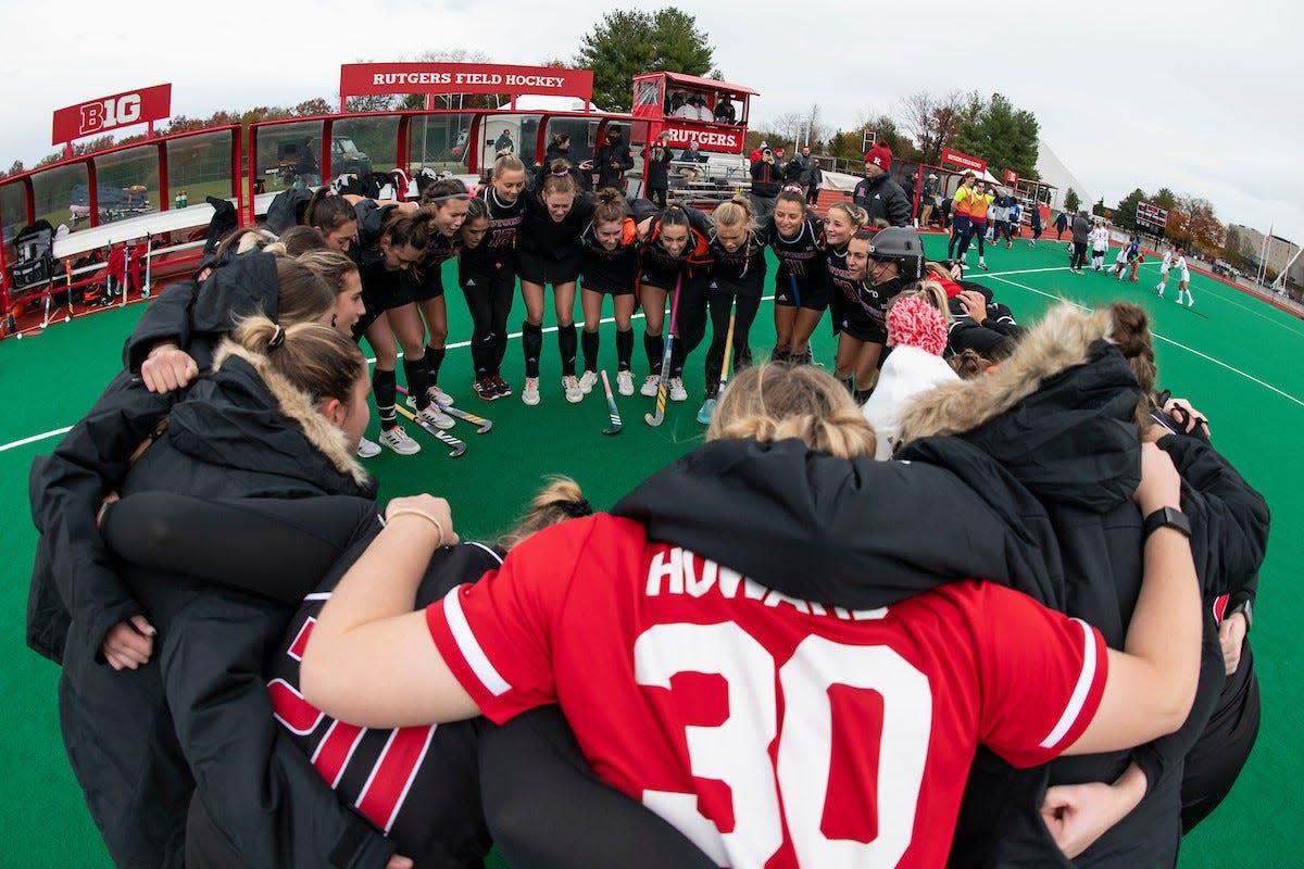 The Rutgers field hockey team huddles before its Elite Eight matchup against Liberty on Nov. 14, 2021, at the Bauer Track and Field Complex in Piscataway.