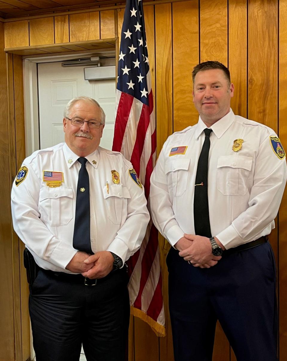 Danbury Fire Chief Keith Kahlero, left, stands with the new fire chief, Shawn Hunsicker.