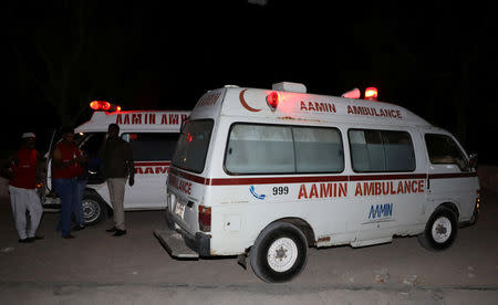 Aamin ambulances are seen after evacuating injured civilians from the scene of an explosion near the Presidential palace in Mogadishu, Somalia February 23, 2018. REUTERS/Feisal Omar