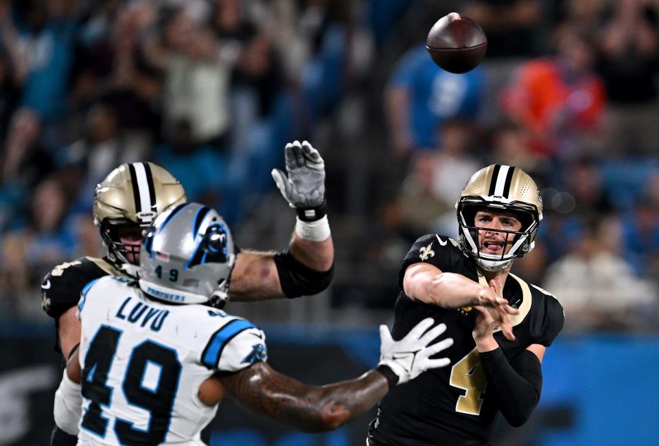 CHARLOTTE, NORTH CAROLINA - SEPTEMBER 18: Derek Carr #4 of the New Orleans Saints throws a pass against the Carolina Panthers during the first quarter in the game at Bank of America Stadium on September 18, 2023 in Charlotte, North Carolina. (Photo by Grant Halverson/Getty Images)