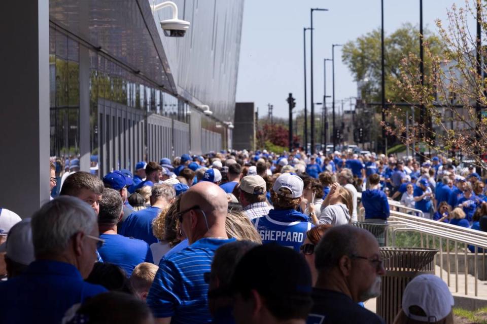 Fans lined up for hours outside Rupp Arena on Sunday waiting to get inside for Mark Pope’s introductory press conference as Kentucky’s new men’s basketball coach.