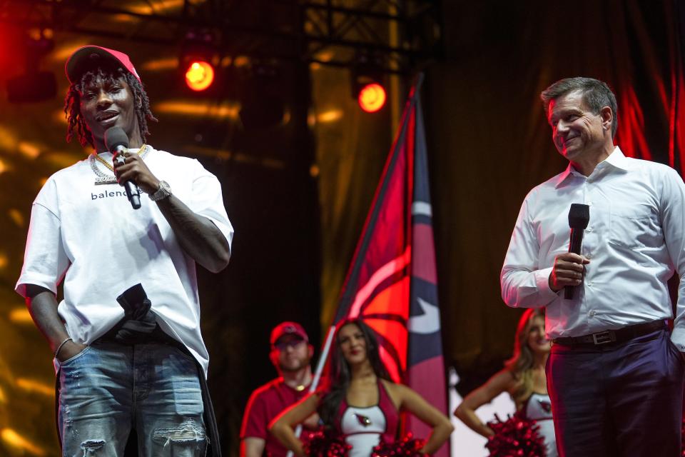 Marquise Brown joins Michael Bidwill, Owner of the Cardinals, during a watch party for fans next to State Farm Stadium on April 28, 2022, in Glendale. Brown was traded to the Cardinals by the Ravens and was brought to Glendale for the Draft Party.