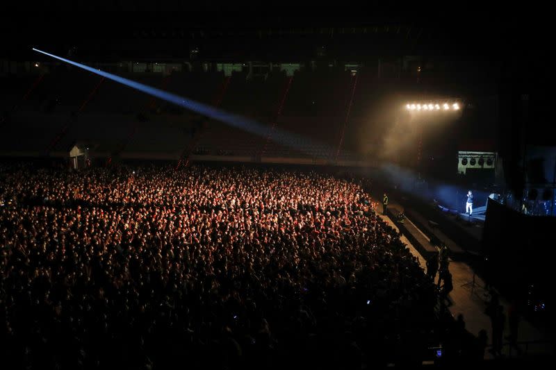 People attend first massive concert since the beginning of COVID-19 pandemic in Barcelona