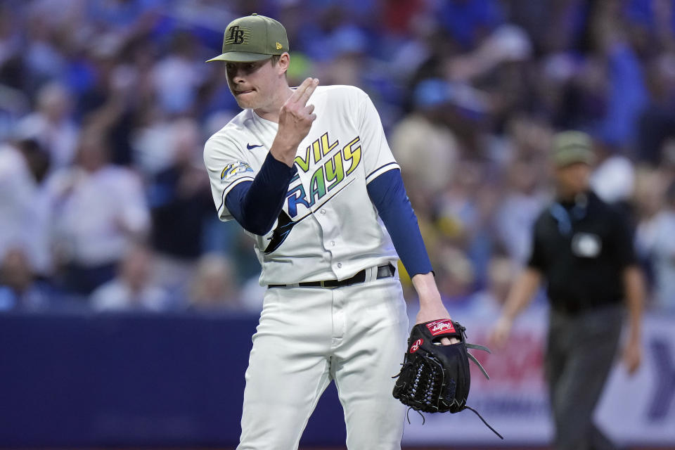 Tampa Bay Rays relief pitcher Pete Fairbanks reacts after closing out the Milwaukee Brewers during the ninth inning of a baseball game Friday, May 19, 2023, in St. Petersburg, Fla. (AP Photo/Chris O'Meara)