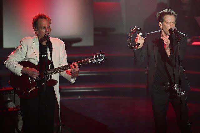 <p>ANGELA WEISS/AFP via Getty</p> Michael and Kevin Bacon perform at the Songwriters Hall of Fame gala in New York City on June 13, 2024