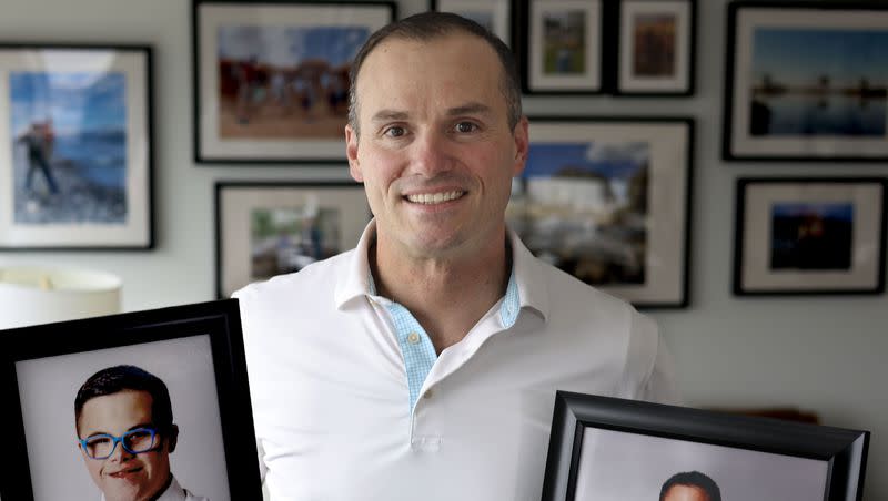 Brady Murray holds photographs of his sons, Nash, 15, and Cooper, 11, in his office in Lehi on Friday, March 10, 2023. Murray is the founder and president of Racing for Orphans with Down Syndrome (RODS Racing), a nonprofit dedicated to helping orphaned children who have Down syndrome find loving homes.