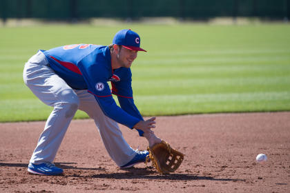 Kris Bryant (76) fields a ground ball during a spring training workout. (USA TODAY Sports)