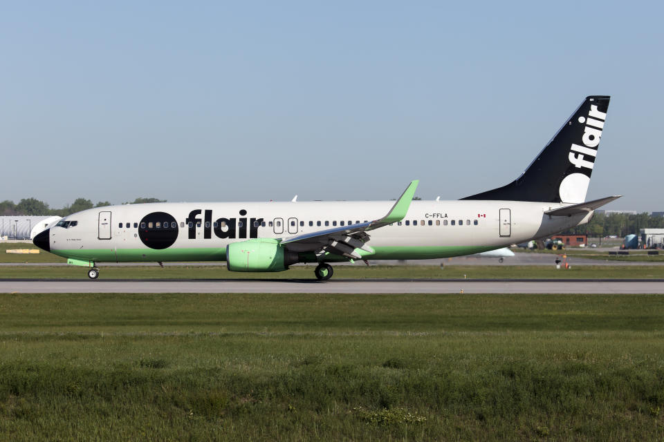 MONTREAL, QUEBEC, CANADA - 2022/05/25: A Flair Airlines Boeing 737-8 just landed at Montreal Pierre Elliott Trudeau Int'l Airport. Flair Airlines is a Canadian low-cost airline headquartered in Edmonton, Alberta, with its main operating base at Edmonton International Airport. (Photo by Fabrizio Gandolfo/SOPA Images/LightRocket via Getty Images)