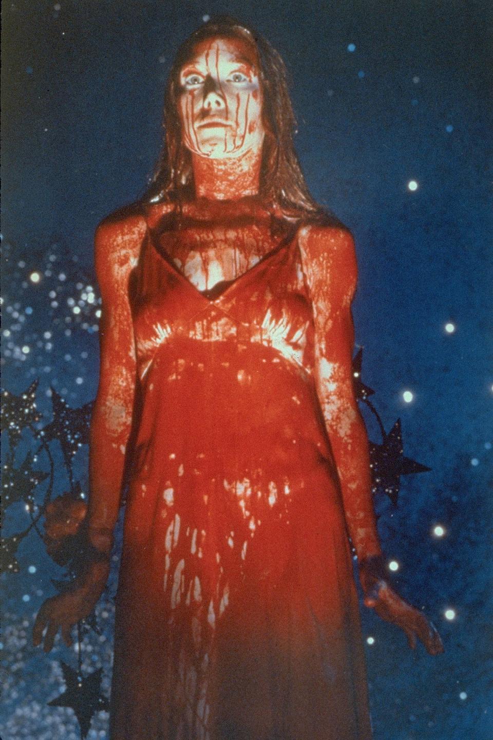 Sissy Spacek's teenage title character gets drenched in pig's blood and goes berzerk in "Carrie."