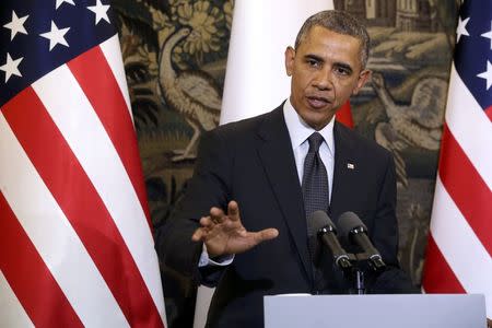 U.S. President Barack Obama addresses during a press conference at Belveder Palace in Warsaw June 3, 2014. REUTERS/Kuba Atys/Agencja Gazeta