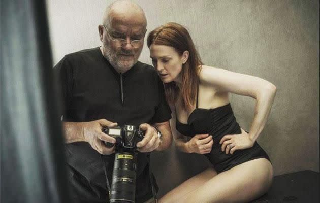 Julianna Moore consults with photographer Peter Lindbergh during the shoot.