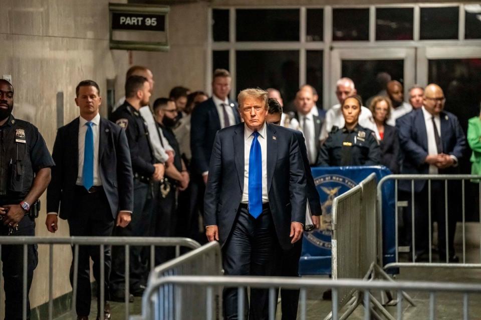 Donald Trump leaves a criminal courtroom in Manhattan after jury convicted him on 34 counts of falsifying business records (Getty Images)