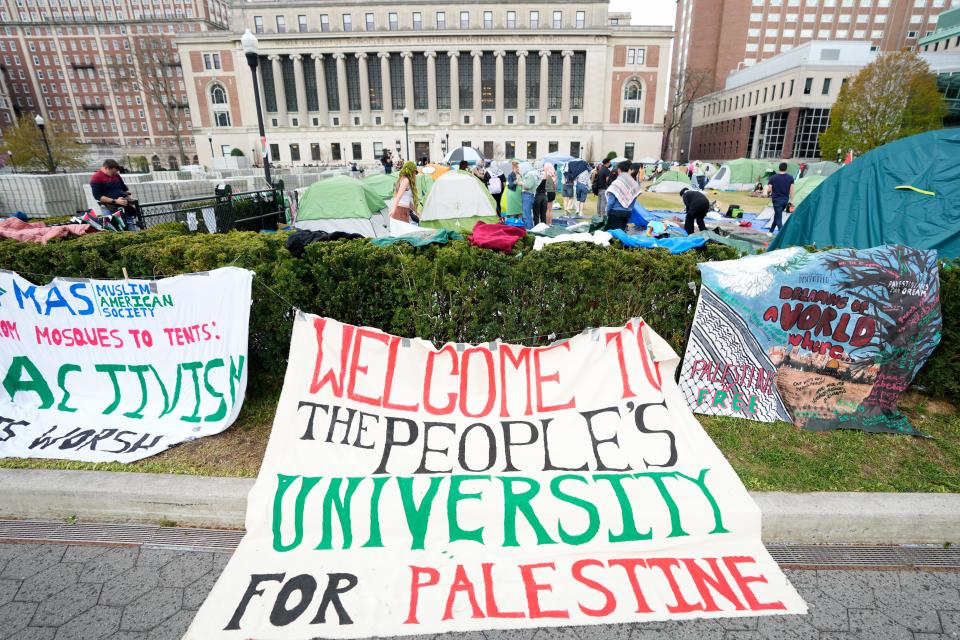 A sign which reads, "Welcome to the People's University for Palestine" is shown just outside the encampment, on the campus of Columbia University, Wednesday, April 24, 2024, in New York City.