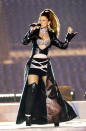 The queen of country music brought a touch of glamour to the 2003 Superbowl, appearing on-stage in a tight dress, complete with black and silver shorts and a glittering choker necklace. She's never lets us down when it comes to glamming it up.