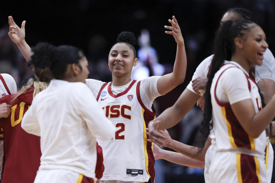 Southern California guard JuJu Watkins reacts after a Sweet 16 college basketball game against Baylor in the women's NCAA Tournament, Saturday, March 30, 2024, in Portland, Ore. Southern California won 74-70. (AP Photo/Howard Lao)