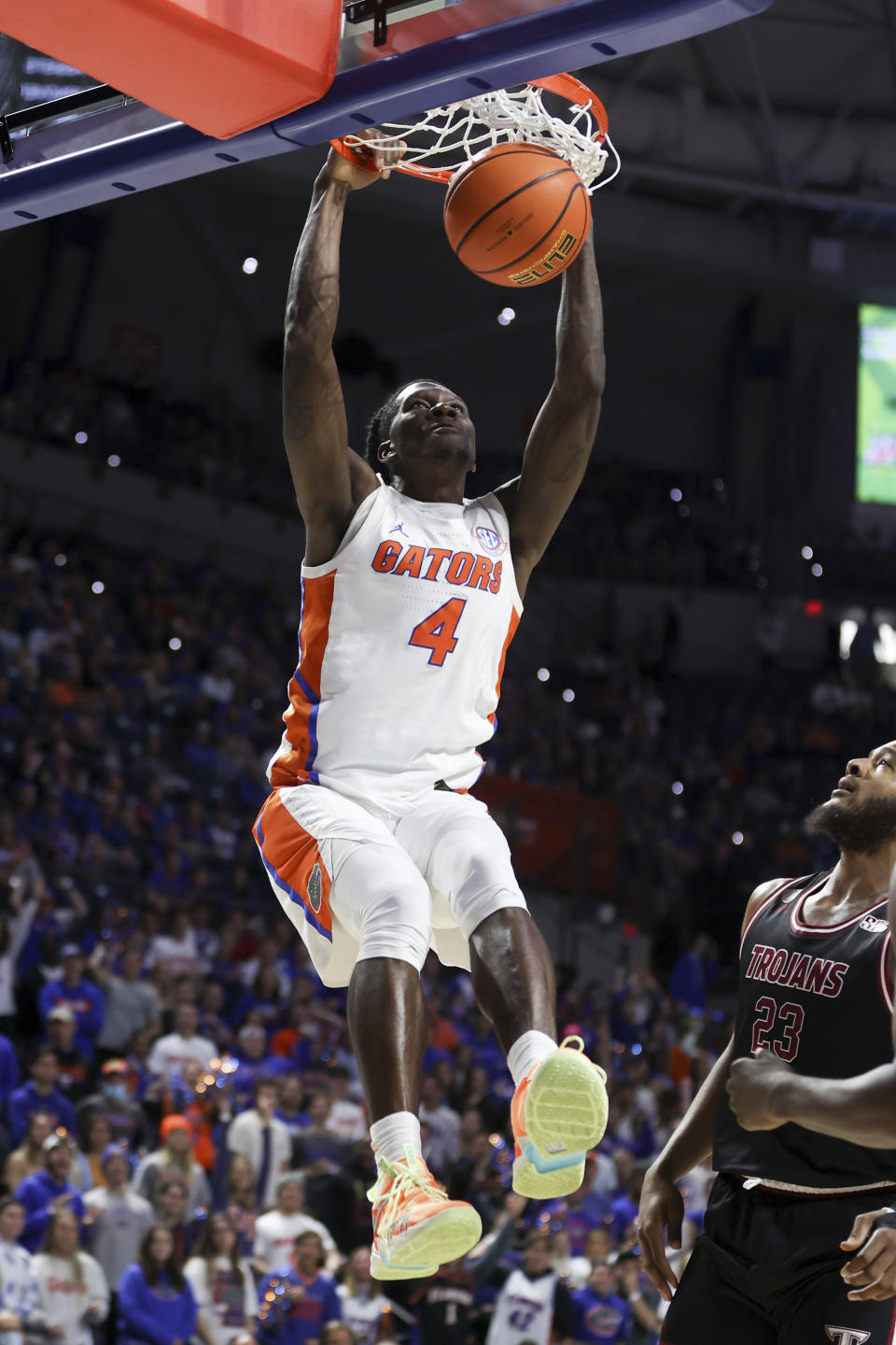 Florida forward Anthony Duruji (4) dunks against Troy during the first half of an NCAA college basketball game Sunday, Nov. 28, 2021, in Gainesville, Fla. (AP Photo/Matt Stamey)