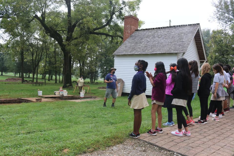 Dr. M. Jay Stottman, assistant director at the Kentucky Archeological Survey introduces a fifth-grade Farmer Elementary School class to archeology at Riverside: The Farnsley-Moremen Landing.