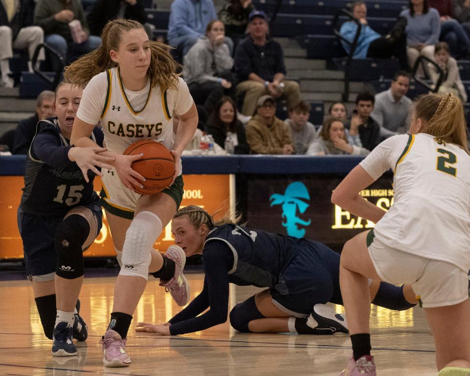 RBC Lola Giordano picks up a loose ball and heads towards the basket. Red Bank Catholic Girls Basketball vs Manasquan in Shore Conference Semifinal game in Toms River NJ on February 15, 2023. 