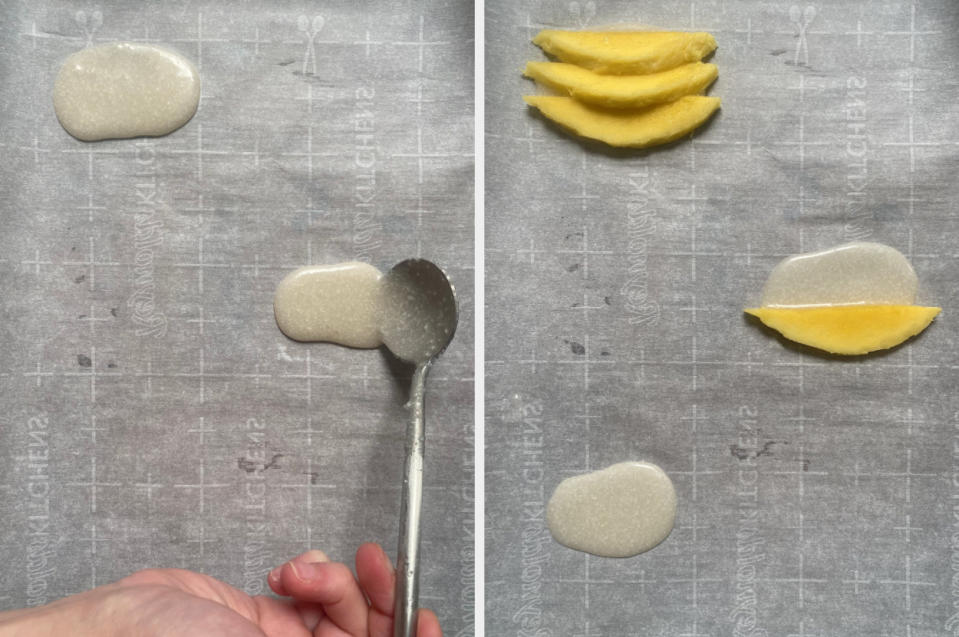 A baking sheet with dollops of coconut cream and sliced mango on top