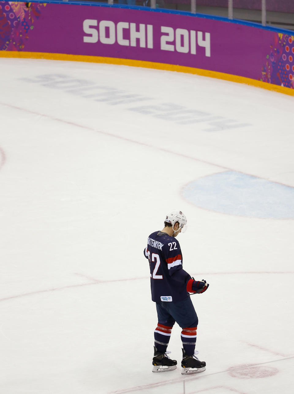 Kevin Shattenkirk of the United States (22) skates off the ice after the team's 5-0 loss to Finland in the men's bronze medal ice hockey game at the 2014 Winter Olympics, Saturday, Feb. 22, 2014, in Sochi, Russia. (AP Photo/Matt Slocum)