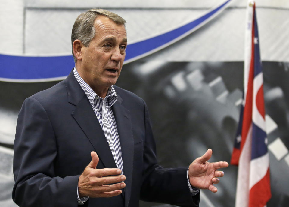 This Monday, May 5, 2014 photo shows House Speaker John Boehner speaking to employees during a tour of the Machintek Corp. plant in Fairfield, Ohio. Boehner is expected to win his bid for a 13th term in southwestern Ohio, despite some unhappiness among GOP voters about the federal deficit and immigration. The Republican faces two tea party opponents, high school teacher J.D. Winteregg and businessman Eric Gurr in the Eighth District. (AP Photo/Al Behrman)