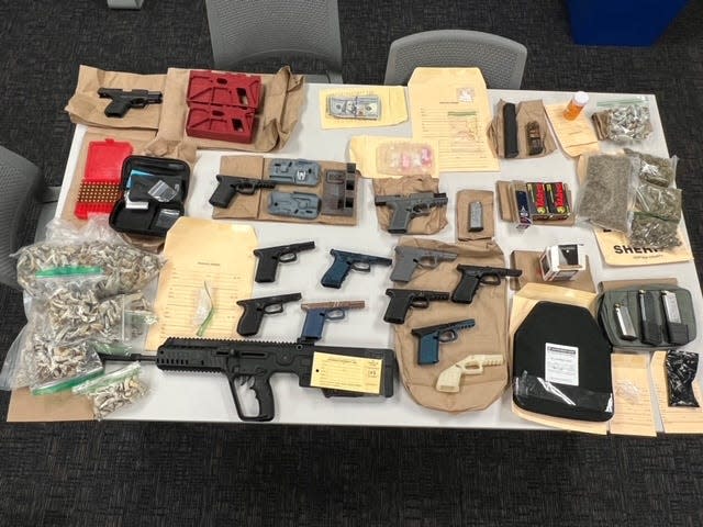 Firearms and drugs were confiscated from suspected traffickers in Port Hueneme on Monday.