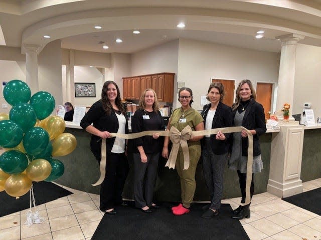 Staff of Bronson Obstetrics & Gynecology Specialists join Bronson Mothers’ Milk Bank representatives for a ceremony to signify their partnership and the opening of the new Milk Depot at 3238 Capital Ave. SW. Pictured, from left, are Lindsay Starks, Mothers’ Milk Bank supervisor; Jenny Ames, OB/GYN practice manager; Dr. Briana Brinkley, OB/GYN physician; Naomi Kellems, OB/GYN practice clinical supervisor; and Sarah Clark, clinical nutrition system manager.