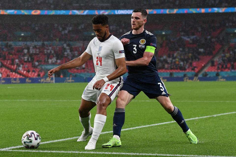 Reece James shields the ball from Andy Robertson (Getty)