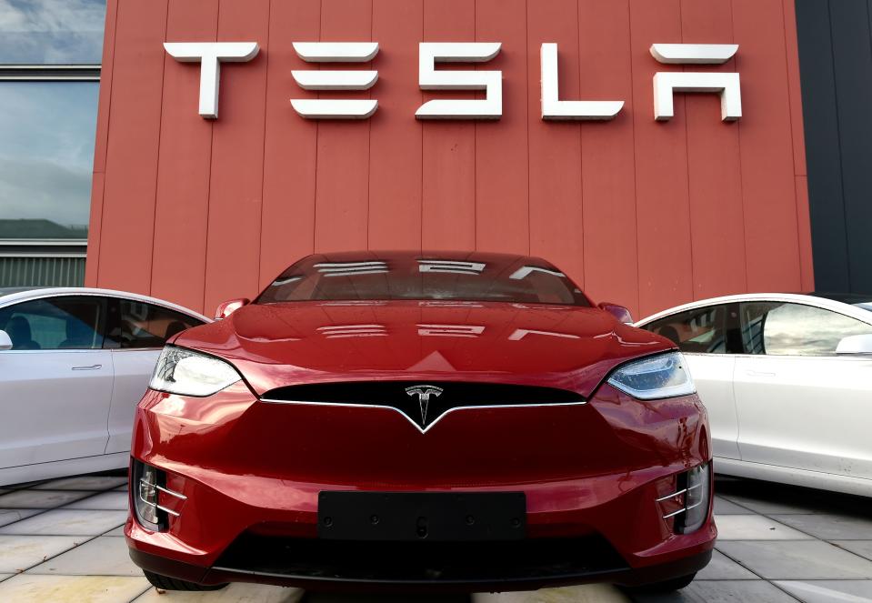 The logo marks the showroom and service center for the US automotive and energy company Tesla in Amsterdam on October 23, 2019. (Photo by JOHN THYS / AFP) (Photo by JOHN THYS/AFP via Getty Images)