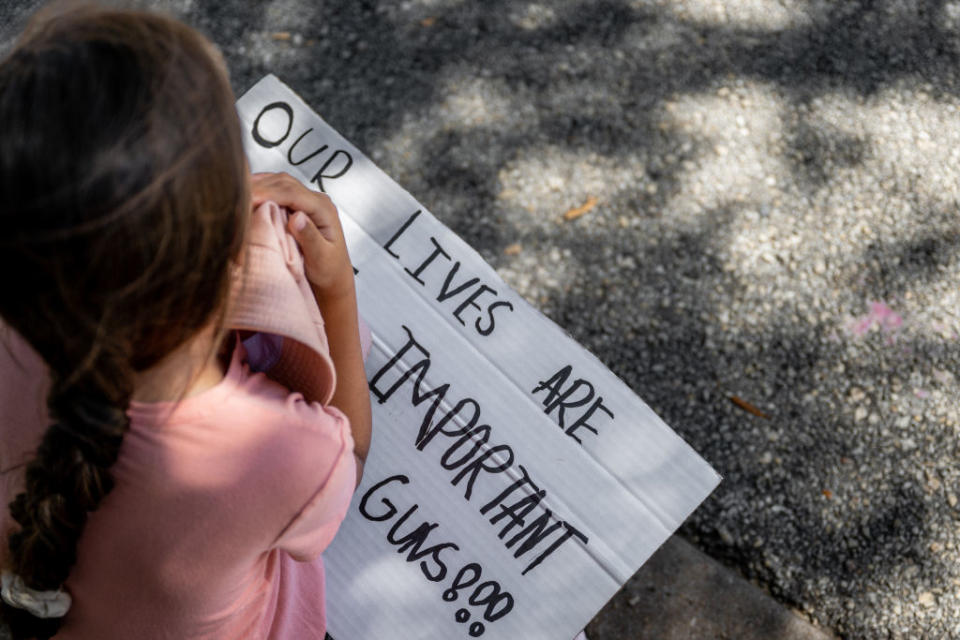 Ivy Miller, 9, sits with a sign while participating in a March for Our Lives rally at the Texas state Capitol in Austin, Texas, on June 11<span class="copyright">Brandon Bell–Getty Images</span>