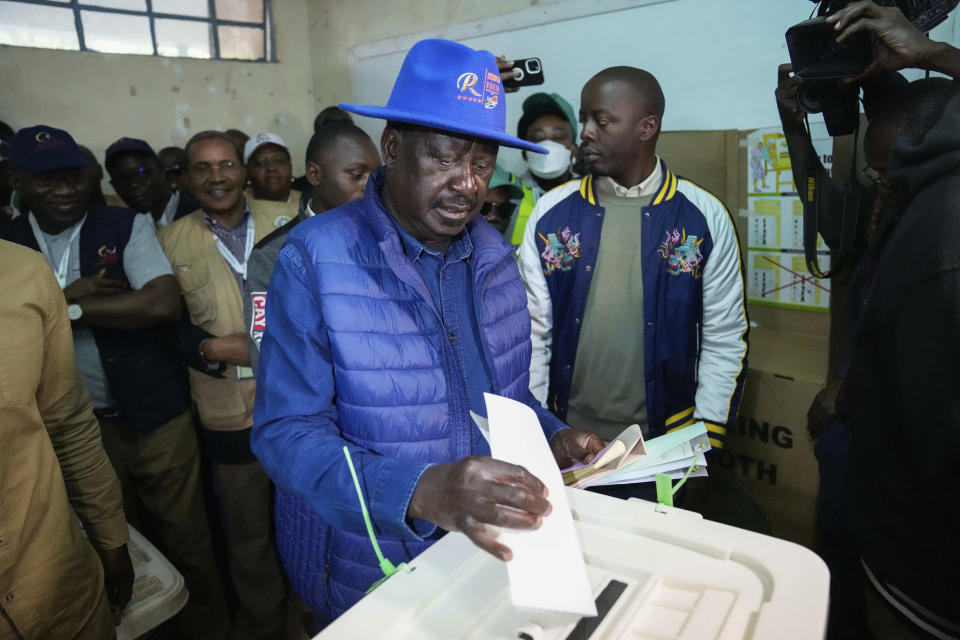 Presidential candidate Raila Odinga casts his vote inside a polling station at the Kibera Primary School in Nairobi, Kenya, Tuesday, Aug. 9, 2022. Kenyans are voting to choose between opposition leader Raila Odinga and Deputy President William Ruto to succeed President Uhuru Kenyatta after a decade in power. (AP Photo/Mosa'ab Elshamy)