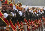 <p>Indian Railway Protection Force (RPF) personnel march during a parade to mark during Republic Day celebrations in Secunderabad on January 26, 2016. Celebrations are underway across India, as the country marks its 67th Republic Day. </p>