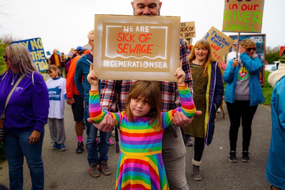 Campaigners march near Fistral Beach, Newquay, as they took part in a National Day of Action on Sewage Pollution in April 2022 (Ben Birchall/PA) (PA Wire)