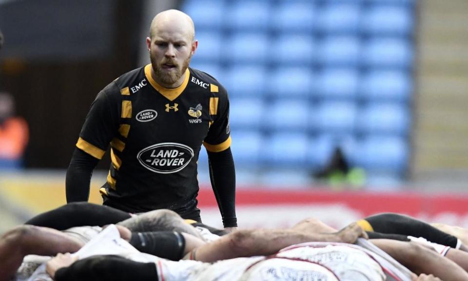 Wasps’ Joe Simpson stands over the scrum.