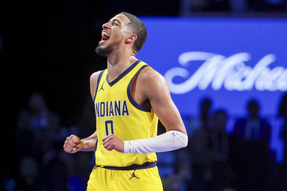 Indiana Pacers guard Tyrese Haliburton (0) yells after a play against the Milwaukee Bucks during the second half of a semifinal in the NBA basketball In-Season Tournament, Thursday, Dec. 7, 2023, in Las Vegas. (AP Photo/Ian Maule)