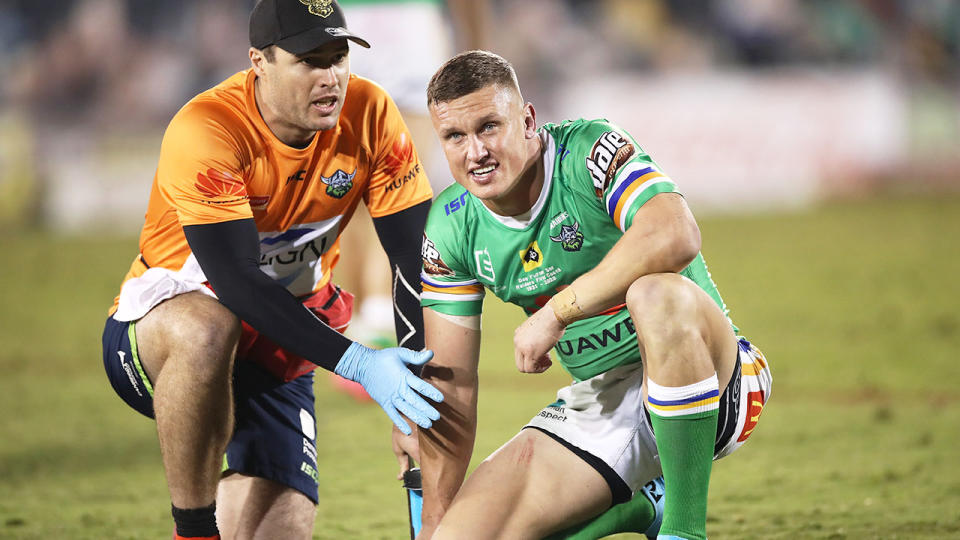 Pictured here, Raiders star Jack Wighton gets assistance from a trainer after copping a heavy hit.