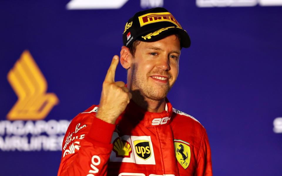 Sebastian Vettel's famous right index finger returned following his victory in Singapore - Getty Images AsiaPac