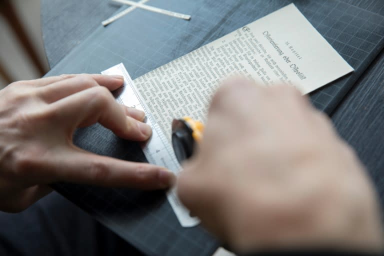 Austrian artist Andreas Joska-Sutanto is cutting up 'Mein Kampf' letter by letter (Alex HALADA)
