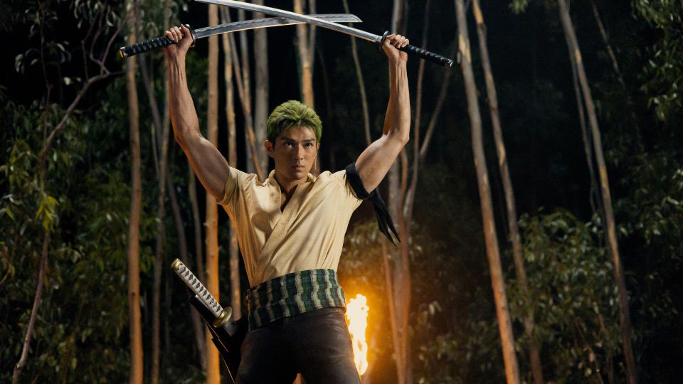 Zoro holds several swords aloft in a still from Netflix's One Piece adaptation