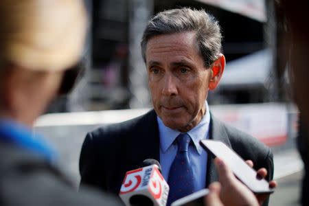 Edward Blum, founder of Students for Fair Admissions (SFFA), speaks to reporters at the "Rally for the American Dream - Equal Education Rights for All," ahead of the start of the trial in a lawsuit accusing Harvard University of discriminating against Asian-American applicants, in Boston, Massachusetts, U.S., October 14, 2018. REUTERS/Brian Snyder