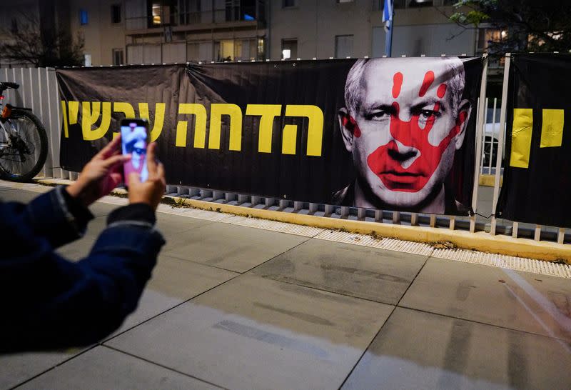 People protest against Israeli Prime Minister Benjamin Netanyahu's government in Tel Aviv