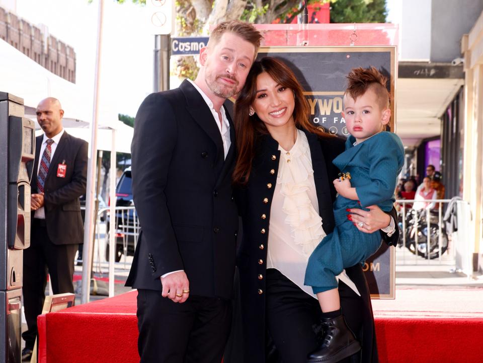 Macaulay Culkin, Brenda Song, and their oldest son at the Hollywood Walk of Fame on December 1, 2023.