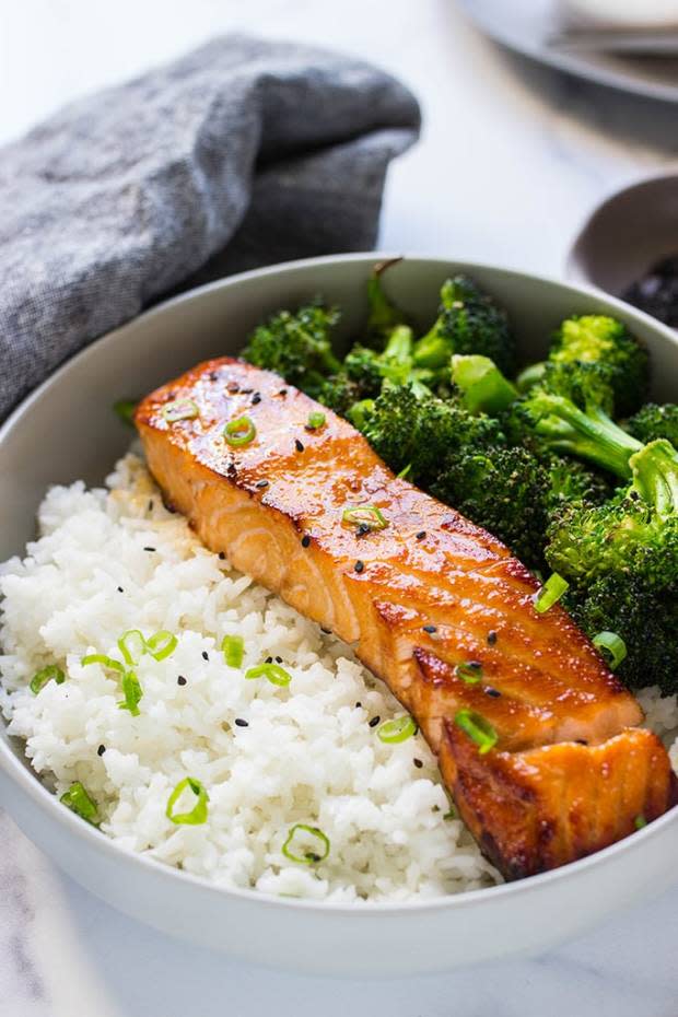 <p>The Cooking Jar</p><p>This delicious and perfectly caramelized, healthy four-ingredient air fryer honey garlic salmon has a sweet and sticky sauce and cooks in less than 10 minutes.</p><p><strong>Get the recipe: <a href="https://thecookingjar.com/air-fryer-honey-garlic-salmon/" rel="nofollow noopener" target="_blank" data-ylk="slk:Air Fryer Honey Garlic Salmon;elm:context_link;itc:0;sec:content-canvas" class="link ">Air Fryer Honey Garlic Salmon</a></strong></p><p><strong>Related: <a href="https://parade.com/1177364/kelli-acciardo/ninja-air-fryer-recipes/" rel="nofollow noopener" target="_blank" data-ylk="slk:55+ Best Ninja Air Fryer Recipes;elm:context_link;itc:0;sec:content-canvas" class="link ">55+ Best Ninja Air Fryer Recipes</a></strong></p>