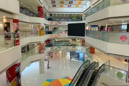 FILE PHOTO: Retailer stores inside a shopping mall have closed down for half day following a violent attack on residents happened at Yuen Long, in Hong Kong