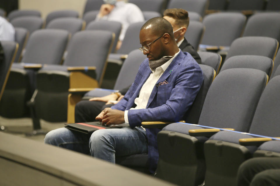 Lonnie McQuirter, owner of 36 Lyn Refuel Station in Minneapolis, waits to testify during a hearing Wednesday, July 1, 2020 in St. Paul, Minn. about his business which was destroyed during civil unrest after the death of George Floyd. Minnesota Republican lawmakers opened a series of hearings on the unrest that rocked the state after the death of Floyd who died in police custody, focusing Wednesday on the lawlessness and destruction of small businesses that ensued. (AP Photo/Jim Mone)