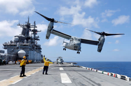 A Marine Corps MV-22B Osprey takes off from the USS Kearsarge aircraft carrier as U.S. military continues to evacuate personnel from the U.S. Virgin Islands in advance of Hurricane Maria, in the Caribbean Sea near the islands September 18, 2017. REUTERS/Jonathan Drake