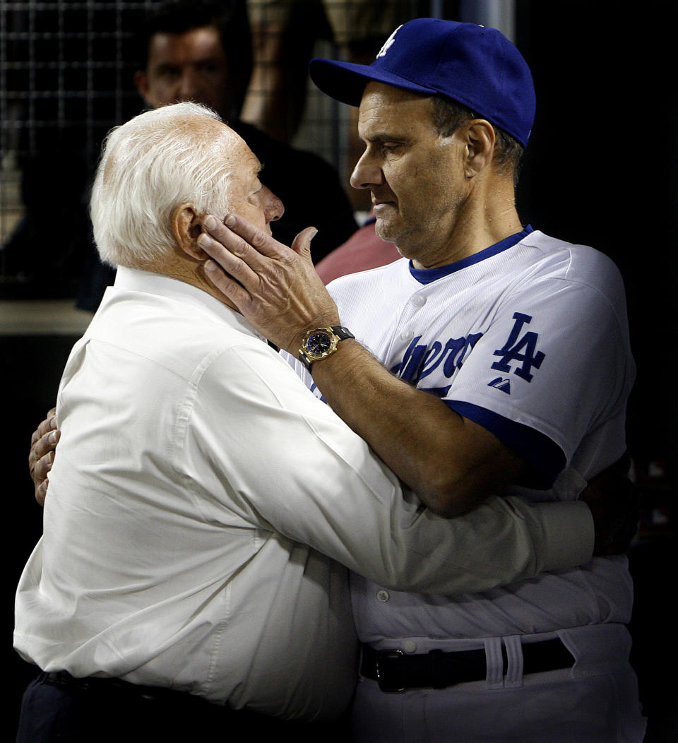 Hall of Fame and former Los Angeles Dodgers manager Tommy Lasorda passed away at the age of 93. Tommy Lasorda with Joe Torre as the Phillies beat the Dodgers 5-1 to win the National League pennant during a National League Championship Series baseball game between the Philadelphia Phillies and the Los Angeles Dodgers on Wednesday October 15, 2008, at Dodger Stadium. (Keith Birmingham/The Orange County Register via AP)