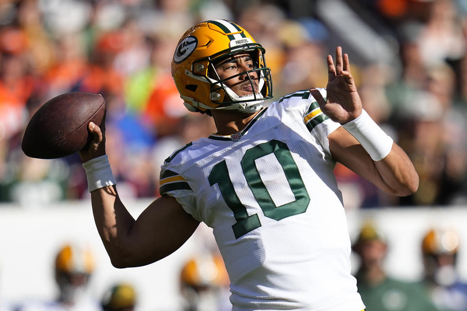 Green Bay Packers quarterback Jordan Love (10) passes against the Denver Broncos during the first half of an NFL football game in Denver, Sunday, Oct. 22, 2023. (AP Photo/Jack Dempsey)